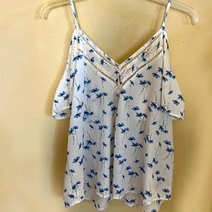 Sheer white blouse with blue flowers